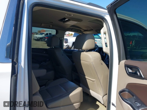 2017 Chevrolet Suburban Premier z VIN 1GNSCJKC7HR142082, wystawiony jako IAAI lot #41749026 z przebiegiem 152 415 mil mil oraz . Historia ofert i sprzedaży dostępna na DreamBid. Obrazek 8.
