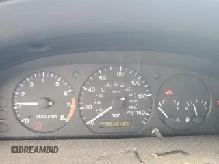 2000 Mazda 626 LX with VIN 1YVGF22C3Y5126135, listed as a Copart auction lot 70650264 with 154,517 mi miles and Salvage Title. Bid and sale history available at carsss.com. Image 9.