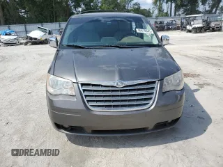2010 Chrysler Town & Country Touring Plus with VIN 2A4RR8DX8AR382153, listed as a Copart auction lot 56470045 with 272,459 mi miles and Salvage Title. Bid and sale history available at DreamBid. Image 5.