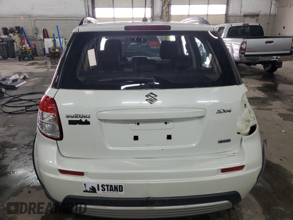 2007 Suzuki SX4 z VIN JS2YB413375101209, wystawiony jako Copart lot #87550235 z przebiegiem 167 788 mil mil oraz Szkoda całkowita • Salvage title. Historia ofert i sprzedaży dostępna na DreamBid. Obrazek 6.
