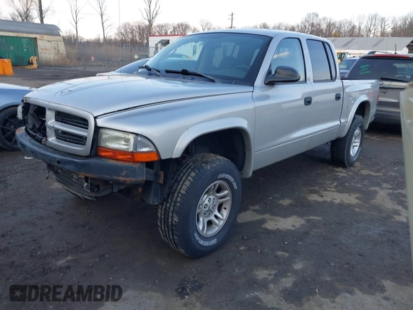 2002 Dodge Dakota Sport with VIN 1B7HG38N12S661043, listed as a IAAI auction lot 41552725 with 206,662 mi miles. Bid and sale history available at carsss.com. Image 2.