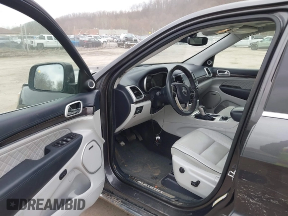 2020 Jeep Grand Cherokee Summit with VIN 1C4RJFJT2LC408499, listed as a IAAI auction lot 41854021 with 78,189 mi miles and . Bid and sale history available at DreamBid. Image 5.