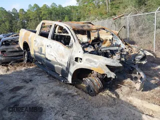 2017 Nissan Titan SV with VIN 1N6AA1EJ1HN562204, listed as a IAAI auction lot 40759190 with Not Provided miles and . Bid and sale history available at DreamBid. Image 1.