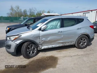 2016 Hyundai Santa Fe z VIN 5XYZTDLB0GG338313, wystawiony jako IAAI lot #42103866 z przebiegiem 111 555 mil mil oraz . Historia ofert i sprzedaży dostępna na DreamBid. Obrazek 14.