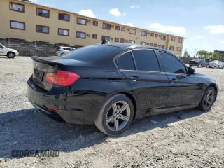 2014 BMW 3 Series 328i with VIN WBA3A5C52EJ464789, listed as a Copart auction lot 56327945 with 153,006 mi miles and Salvage title. Bid and sale history available at DreamBid. Image 3.