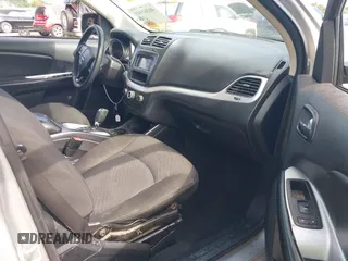 2014 Dodge Journey SE with VIN 3C4PDCAB7ET268221, listed as a IAAI auction lot 40262445 with 153,490 mi miles and . Bid and sale history available at carsss.com. Image 5.