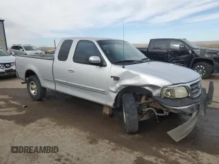 2002 Ford F-150 XL z VIN 1FTRX17W52NA62115, wystawiony jako Copart lot #50415375 z przebiegiem 145 361 mil mil oraz Szkoda całkowita • Salvage title. Historia ofert i sprzedaży dostępna na DreamBid. Obrazek 4.