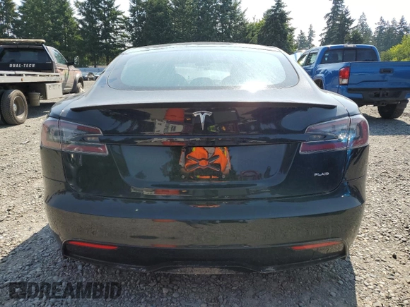2021 Tesla Model S Plaid with VIN 5YJSA1E66MF434066, listed as a Copart auction lot 61648755 with Not provided miles and Salvage title. Bid and sale history available at DreamBid. Image 6.