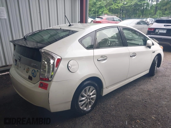 2013 Toyota Prius z VIN JTDKN3DP7D3031267, wystawiony jako IAAI lot #42265759 z przebiegiem 101 339 mil mil oraz . Historia ofert i sprzedaży dostępna na DreamBid. Obrazek 4.