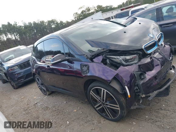 2017 BMW i3 z VIN WBY1Z8C55HV551697, wystawiony jako IAAI lot #41534229 z przebiegiem Nie podano mil oraz . Historia ofert i sprzedaży dostępna na DreamBid. Obrazek 13.
