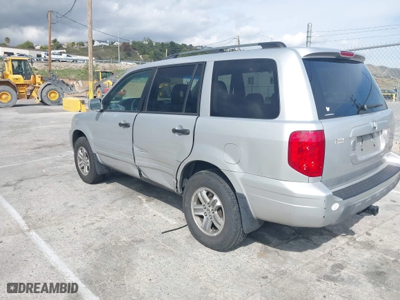 2005 Honda Pilot EX-L with NAVI with VIN 2HKYF18755H552502, listed as a IAAI auction lot 41921122 with 187,904 mi miles. Bid and sale history available at carsss.com. Image 3.