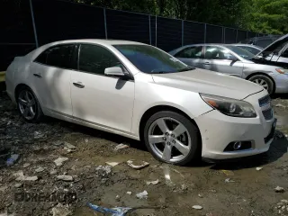 2013 Chevrolet Malibu LTZ with VIN 1G11J5SX6DF340547, listed as a Copart auction lot 54652025 with 132,308 mi miles and Non Repairable. Bid and sale history available at DreamBid. Image 4.
