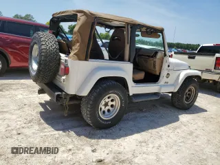 2001 Jeep Wrangler Sahara z VIN 1J4FA59S81P321490, wystawiony jako Copart lot #57320005 z przebiegiem 180 959 mil mil oraz Szkoda całkowita • Salvage title. Historia ofert i sprzedaży dostępna na DreamBid. Obrazek 3.
