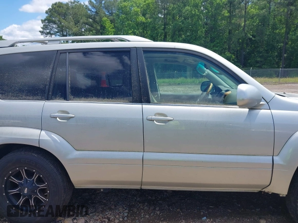 2004 Lexus GX 470 with VIN JTJBT20X640035217, listed as a IAAI auction lot 42156303 with 310,711 mi miles and . Bid and sale history available at DreamBid. Image 14.