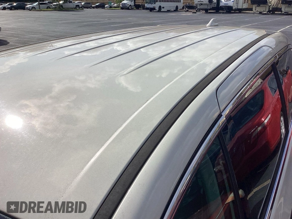 2017 Chrysler Pacifica Touring with VIN 2C4RC1DG5HR764942, listed as a IAAI auction lot 42796303 with 64,391 mi miles and . Bid and sale history available at DreamBid. Image 2.