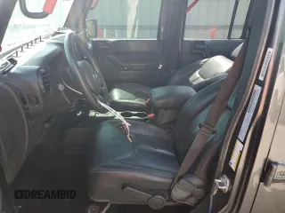 2016 Jeep Wrangler Unlimited Rubicon with VIN 1C4BJWFG8GL192077, listed as a Copart auction lot 58339005 with 62,076 mi miles and Salvage title. Bid and sale history available at DreamBid. Image 7.