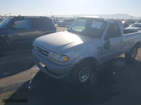 2002 Mazda B-Series 2WD Truck DS with VIN 4F4YR12U22TM11858, listed as a IAAI auction lot 40819886 with 104,051 mi miles. Bid and sale history available at carsss.com. Image 17.