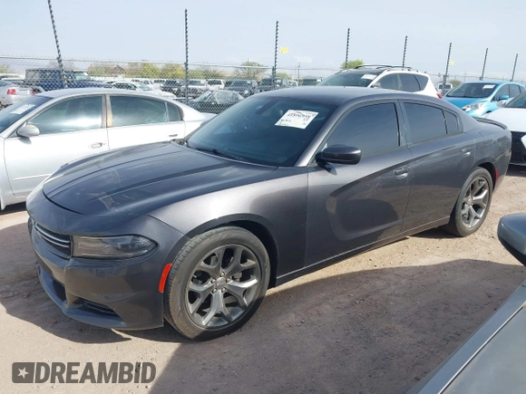2015 Dodge Charger SXT with VIN 2C3CDXHG4FH890684, listed as a IAAI auction lot 41896958 with 118,140 mi miles and . Bid and sale history available at DreamBid. Image 2.