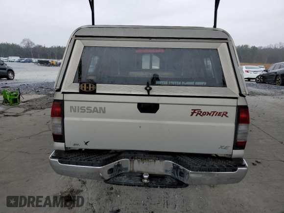 1999 Nissan Frontier XE with VIN 1N6DD26SXXC344449, listed as a Copart auction lot 43748015 with 137,318 mi miles and Salvage title. Bid and sale history available at DreamBid. Image 6.
