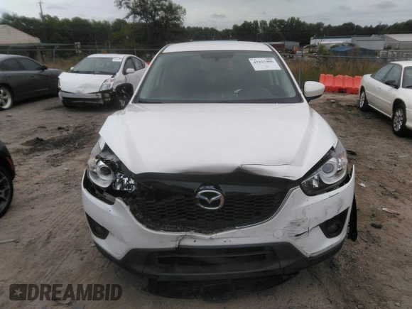 2014 Mazda CX-5 Touring z VIN JM3KE4CY0E0303748, wystawiony jako IAAI lot #42127406 z przebiegiem Nie podano mil oraz . Historia ofert i sprzedaży dostępna na DreamBid. Obrazek 11.
