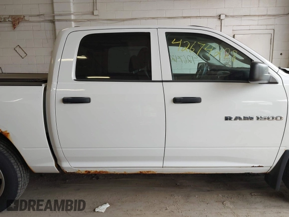 2012 Ram 1500 Express with VIN 1C6RD7KT6CS341995, listed as a IAAI auction lot 42674228 with 202,070 mi miles and . Bid and sale history available at DreamBid. Image 13.