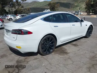 2018 Tesla Model S 75D with VIN 5YJSA1E22JF246928, listed as a IAAI auction lot 41869364 with 100,067 mi miles and . Bid and sale history available at DreamBid. Image 4.