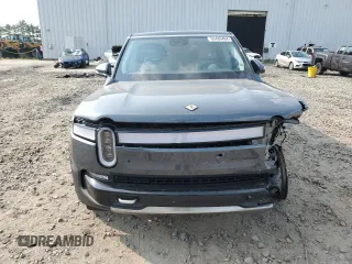 2024 Rivian R1S Adventure z VIN 7PDSGBBA0RN038679, wystawiony jako Copart lot #66486464 z przebiegiem Nie podano mil oraz Szkody całkowita. Historia ofert i sprzedaży dostępna na DreamBid. Obrazek 5.
