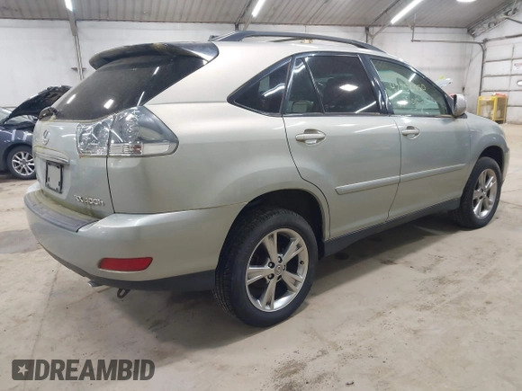 2006 Lexus RX 400h with VIN JTJHW31U960011640, listed as a IAAI auction lot 42256550 with 53,884 mi miles and . Bid and sale history available at DreamBid. Image 4.
