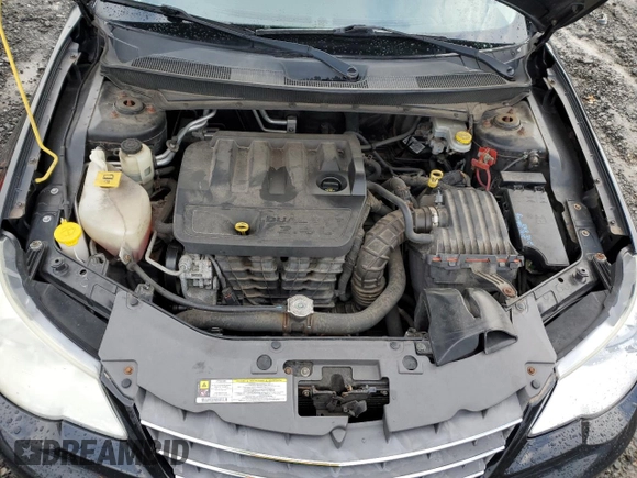 2010 Chrysler Sebring Limited with VIN 1C3CC5FB2AN120496, listed as a Copart auction lot 82131024 with 106,563 mi miles and Salvage Title. Bid and sale history available at carsss.com. Image 11.