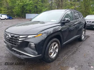 2022 Hyundai Tucson SEL z VIN 5NMJBCAE9NH015906, wystawiony jako IAAI lot #42169136 z przebiegiem 28 009 mil mil oraz . Historia ofert i sprzedaży dostępna na DreamBid. Obrazek 2.