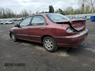 2003 Kia Spectra z VIN KNAFB121835211810, wystawiony jako Copart lot #51289625 z przebiegiem 133 868 mil mil oraz Szkoda całkowita • Salvage title. Historia ofert i sprzedaży dostępna na DreamBid. Obrazek 2.