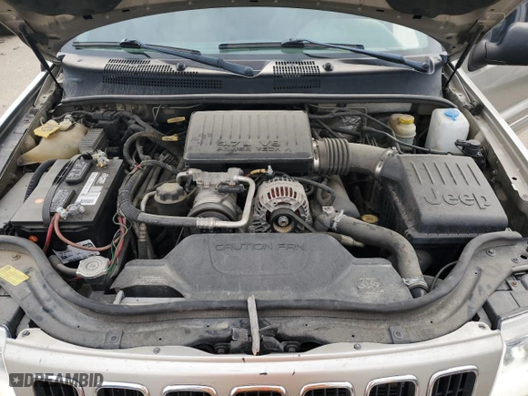 2003 Jeep Grand Cherokee Limited with VIN 1J8GW58N43C546645, listed as a Copart auction lot 77046984 with 186,039 mi miles and Clean Title. Bid and sale history available at carsss.com. Image 12.