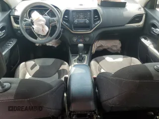 2015 Jeep Cherokee Sport with VIN 1C4PJLAB7FW536303, listed as a Copart auction lot 56233885 with 150,883 mi miles and Salvage title. Bid and sale history available at DreamBid. Image 8.