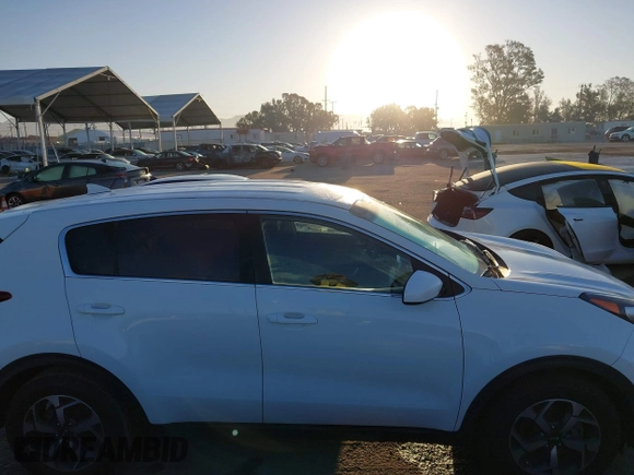 2020 Kia Sportage LX with VIN KNDPM3AC2L7733689, listed as a IAAI auction lot 41858043 with 93,979 mi miles and . Bid and sale history available at DreamBid. Image 13.