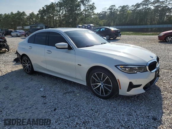 2022 BMW 3 Series 330e with VIN 3MW5P7J03N8C66082, listed as a Copart auction lot 50627595 with 70,799 mi miles and Salvage Title. Bid and sale history available at carsss.com. Image 4.