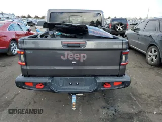 2021 Jeep Gladiator Rubicon with VIN 1C6JJTBG4ML504141, listed as a Copart auction lot 43367565 with 56,879 mi miles and Salvage title. Bid and sale history available at DreamBid. Image 6.