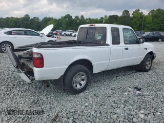 2002 Ford Ranger XL Fleet with VIN 1FTYR44U42TA55243, listed as a Copart auction lot 57310015 with 135,974 mi miles and Salvage title. Bid and sale history available at DreamBid. Image 3.