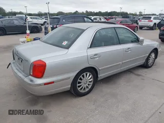 2005 Hyundai XG350 with VIN KMHFU45E65A414567, listed as a IAAI auction lot 41613364 with 264,839 mi miles. Bid and sale history available at carsss.com. Image 4.