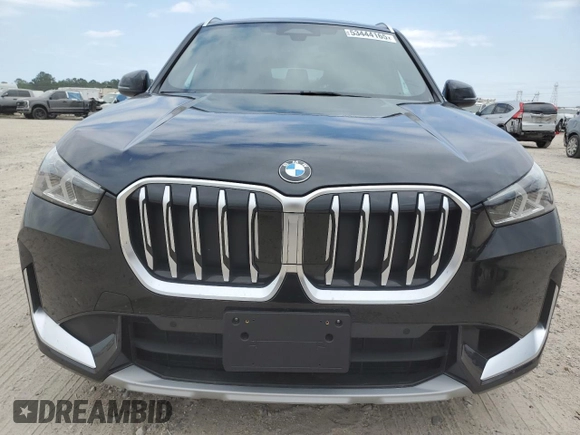 2025 BMW X1 xDrive28i with VIN WBX73EF05S5097084, listed as a Copart auction lot 53444165 with 233 mi miles and Salvage Title. Bid and sale history available at carsss.com. Image 5.