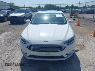 2018 Ford Fusion Titanium with VIN 3FA6P0D98JR134230, listed as a IAAI auction lot 42567084 with 107,459 mi miles and . Bid and sale history available at DreamBid. Image 12.