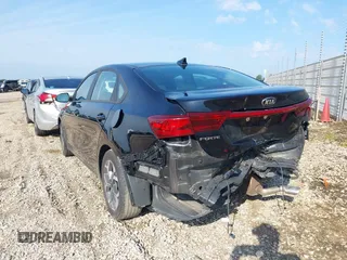 2021 Kia Forte FE with VIN 3KPF24AD1ME341918, listed as a IAAI auction lot 40142663 with 74,715 mi miles and . Bid and sale history available at carsss.com. Image 3.