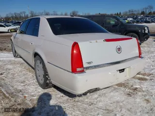 2006 Cadillac DTS w/1SC with VIN 1G6KD57Y86U102513, listed as a IAAI auction lot 41607409 with NaN miles. Bid and sale history available at carsss.com. Image 3.