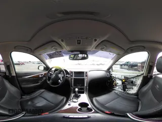 2014 Infiniti Q50 Premium z VIN JN1BV7AP8EM671403, wystawiony jako IAAI lot #41837716 z przebiegiem 115 058 mil mil oraz . Historia ofert i sprzedaży dostępna na DreamBid. Obrazek 22.