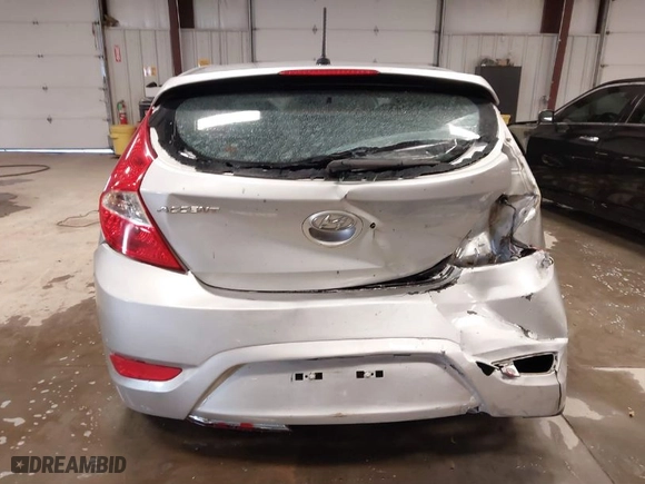 2013 Hyundai Accent GS with VIN KMHCT5AE4DU121779, listed as a IAAI auction lot 41250935 with 152,128 mi miles. Bid and sale history available at carsss.com. Image 17.