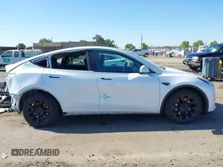 2022 Tesla Model Y Long Range with VIN 7SAYGDEE1NF364241, listed as a IAAI auction lot 42190272 with 54,878 mi miles and . Bid and sale history available at DreamBid. Image 13.