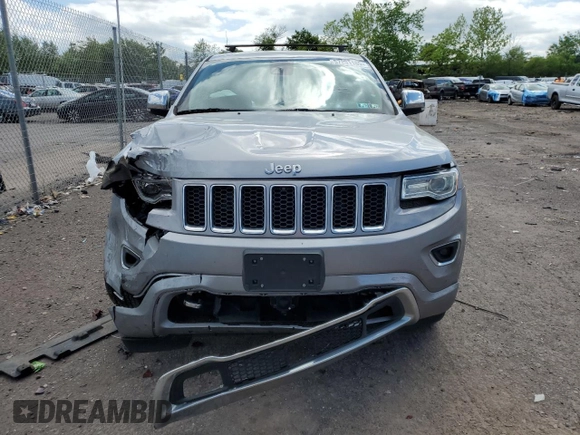 2015 Jeep Grand Cherokee Overland with VIN 1C4RJFCG3FC880084, listed as a Copart auction lot 57291165 with 112,442 mi miles and Salvage title. Bid and sale history available at DreamBid. Image 5.