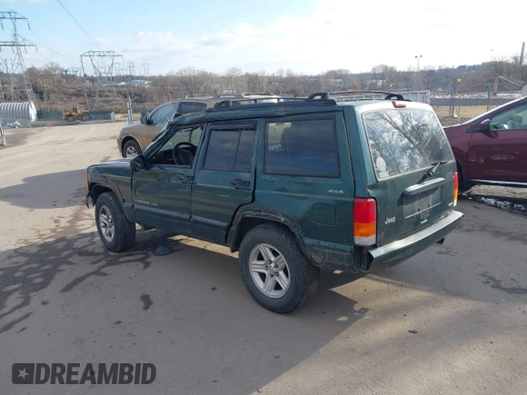 2000 Jeep Cherokee Classic with VIN 1J4FF58S6YL105920, listed as a IAAI auction lot 41497047 with 192,410 mi miles. Bid and sale history available at carsss.com. Image 3.