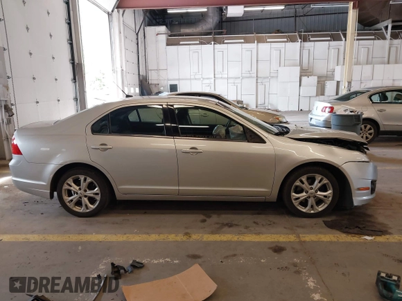 2012 Ford Fusion SE with VIN 3FAHP0HA1CR110433, listed as a IAAI auction lot 42344420 with 260,870 mi miles and . Bid and sale history available at DreamBid. Image 14.