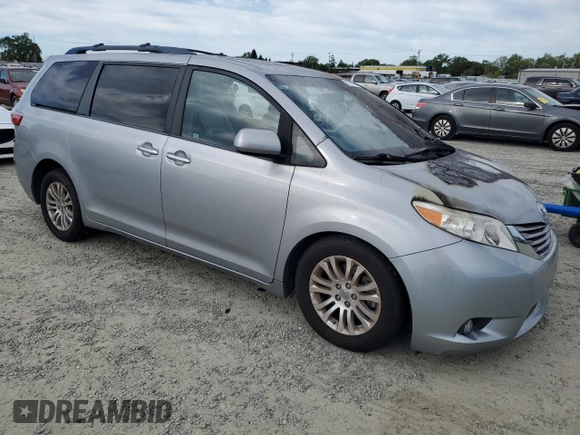 2015 Toyota Sienna XLE with VIN 5TDYK3DC4FS672992, listed as a Copart auction lot 52775715 with Not Provided miles and Non Repairable. Bid and sale history available at DreamBid. Image 4.