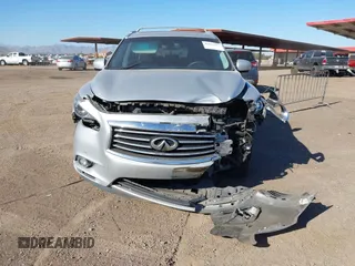 2015 Infiniti QX60 with VIN 5N1AL0MN7FC553099, listed as a IAAI auction lot 42094321 with 100,023 mi miles and . Bid and sale history available at DreamBid. Image 12.